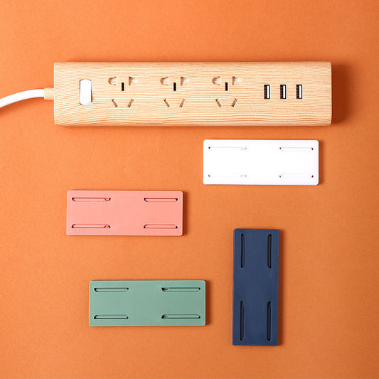 Plug-in fixer hanging wall-free punching socket plug-in row storage rack router plug-in board wall fixer