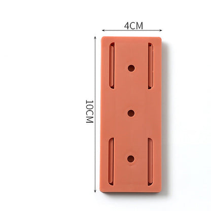 Plug-in fixer hanging wall-free punching socket plug-in row storage rack router plug-in board wall fixer