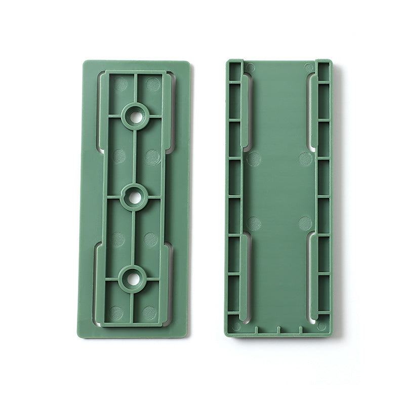 Plug-in fixer hanging wall-free punching socket plug-in row storage rack router plug-in board wall fixer